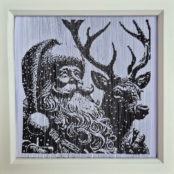 Completed framed folded paper pattern of Santa and reindeer created using Framesmart pattern maker
